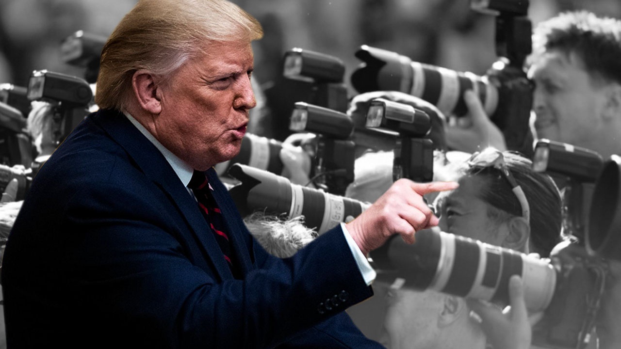 Nhung lan Tong thong Trump khau chien voi truyen thong ve Covid-19 hinh anh