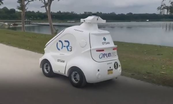 Robot tuan tra cong vien Singapore dam bao gian cach chong Covid-19 hinh anh