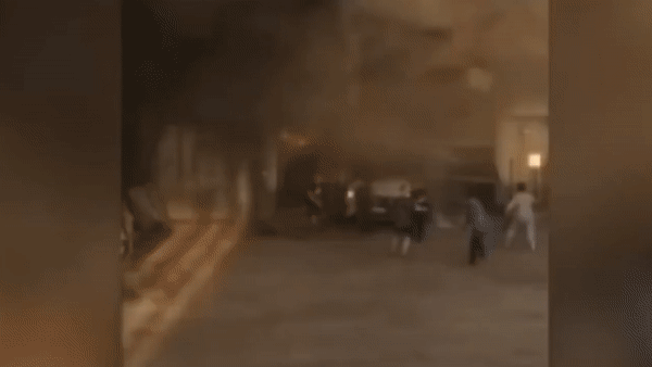 Chay nha chua may bay, tai xe oto thoat chet trong gang tac hinh anh