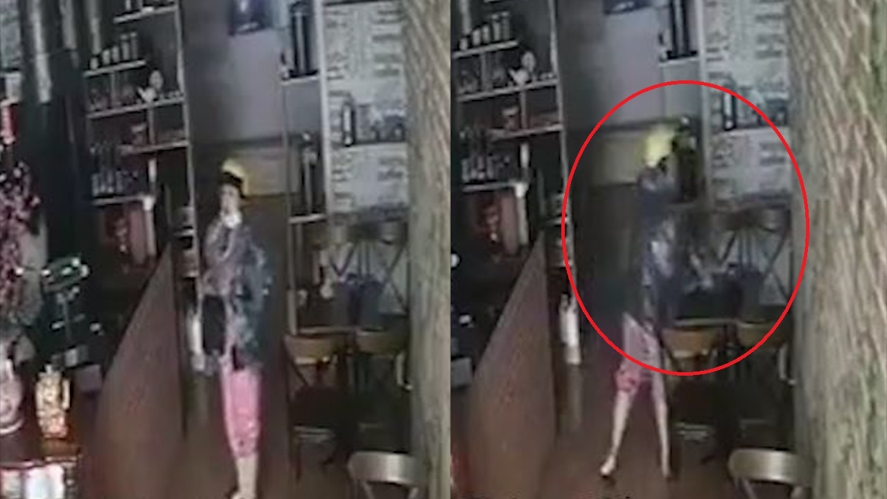 Nguoi phu nu di vao quan nuoc lay trom dien thoai o TP.HCM hinh anh