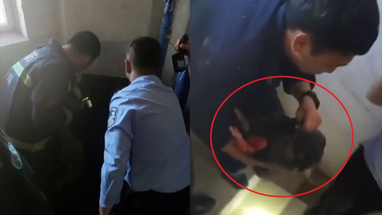 Giai cuu tre so sinh bi ket trong mang rac cua toa chung cu o TQ hinh anh