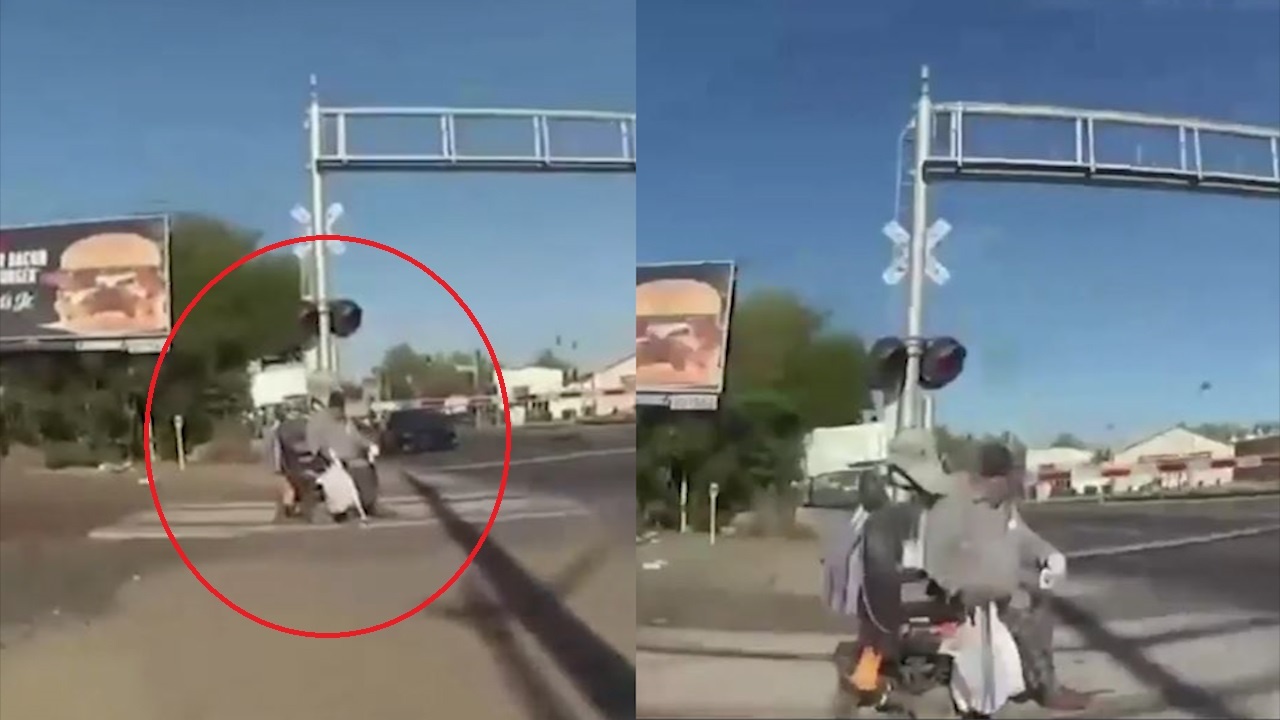 Canh sat My keo nguoi dan ong ra khoi xe lan, tranh doan tau lao toi hinh anh