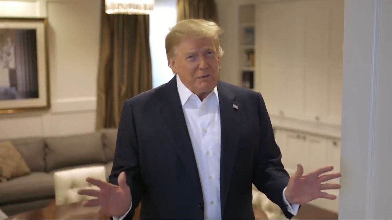 Tong thong Trump dang video moi hinh anh