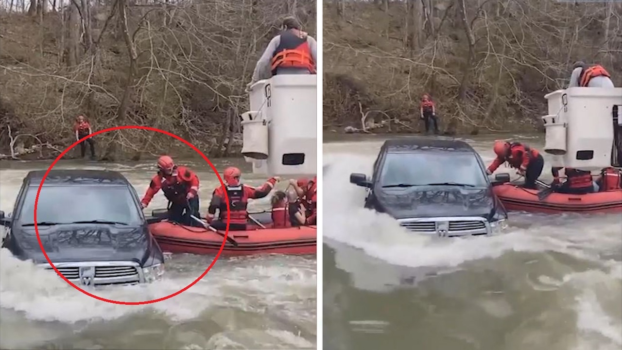 Gia dinh 5 nguoi bi ket trong oto giua dong nuoc hinh anh