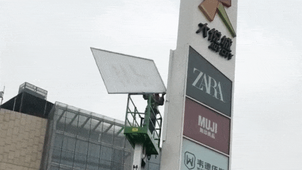 H&M bi tay chay, cong nhan go bang quang cao o Trung Quoc hinh anh