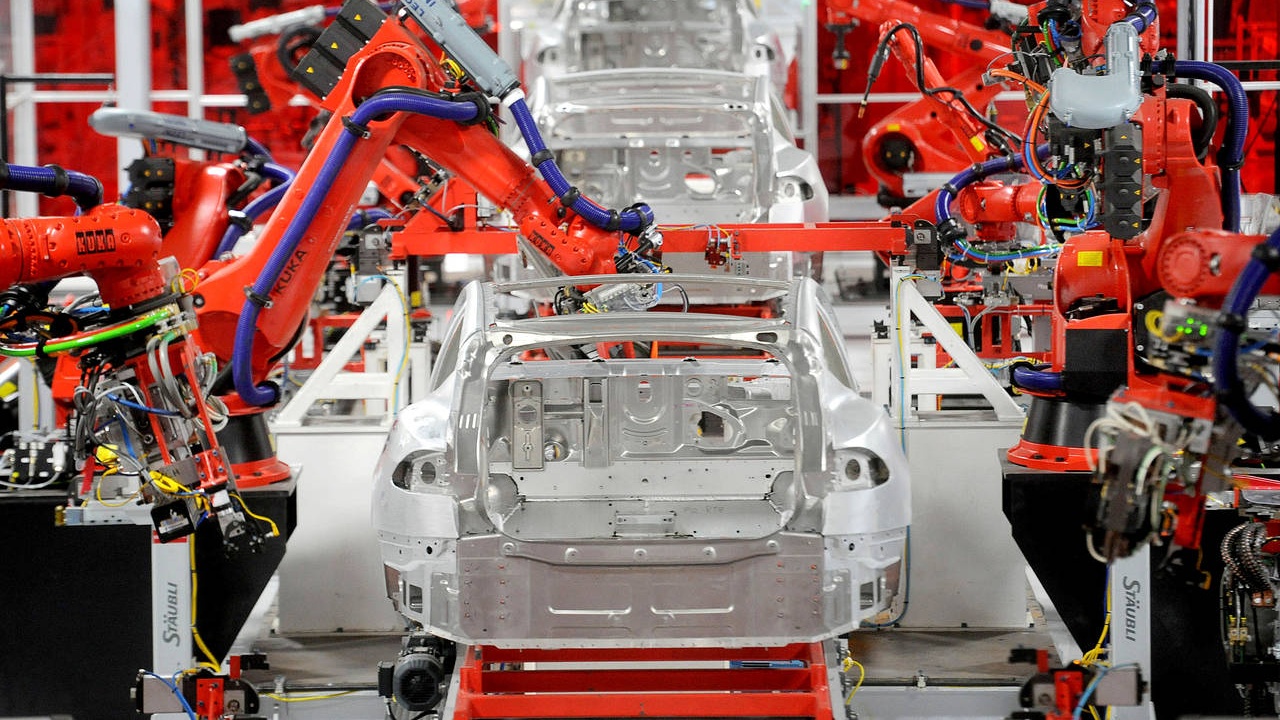 AI da giup Tesla san xuat xe hang loat nhu the nao? hinh anh