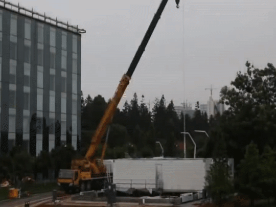 Toa nha 10 tang duoc xay hon mot ngay o Trung Quoc hinh anh