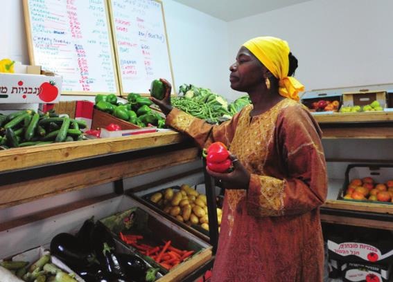 Ngoi lang 4.000 nguoi Do Thai chau Phi an chay de song tho hinh anh