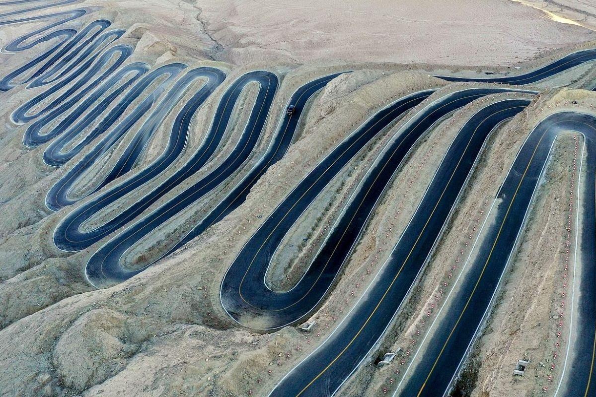 Cung duong qua nui voi 600 khuc cua o Trung Quoc hinh anh