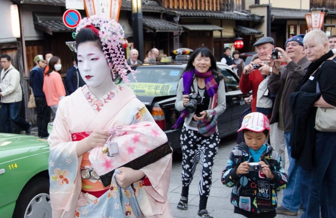 Nguoi Nhat chua muon don khach quoc te hinh anh