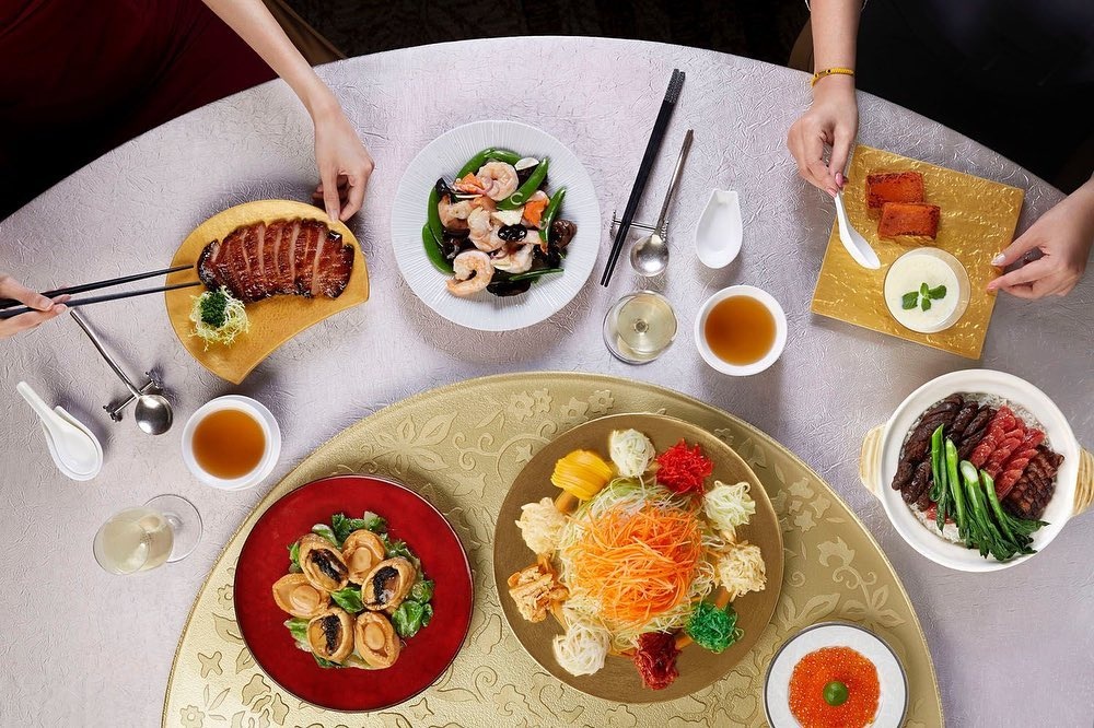 Khoi dau nam moi hung khoi voi cac bua tiec gia dinh o Singapore hinh anh