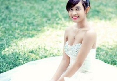 Hot girl Nha Trang lam co dau goi cam dau nam moi hinh anh