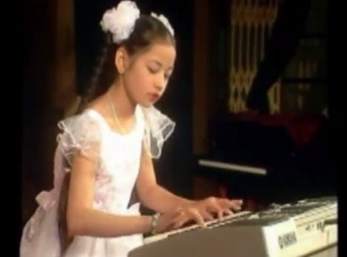 Chi Pu danh dan nam 10 tuoi hinh anh