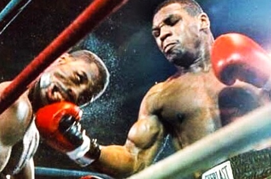 Mike Tyson knock-out doi thu sau 9 giay vao nam 15 tuoi hinh anh