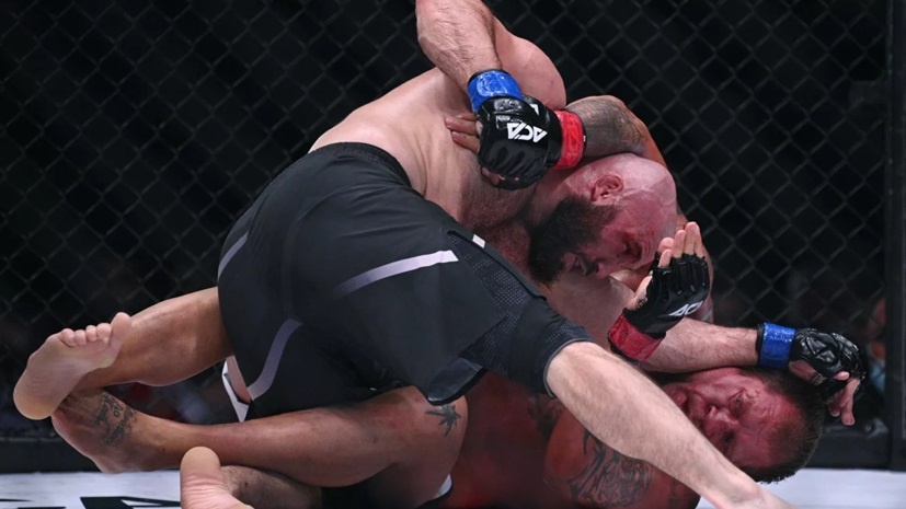 Vo si Nga ha knock-out doi thu nang 116 kg hinh anh