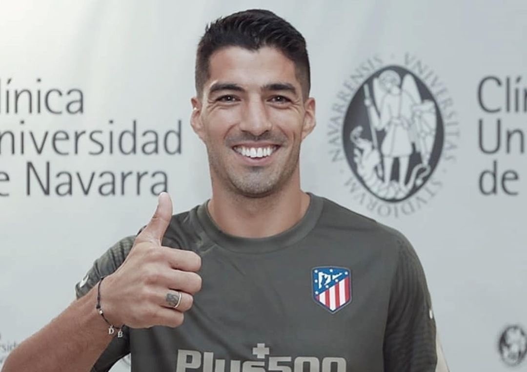 Suarez hoan tat thu tuc khoac ao Atletico Madrid hinh anh