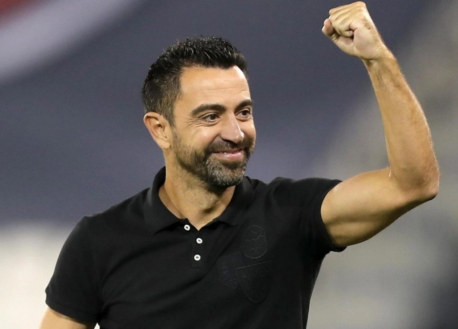 Xavi dong y dan dat Barca hinh anh