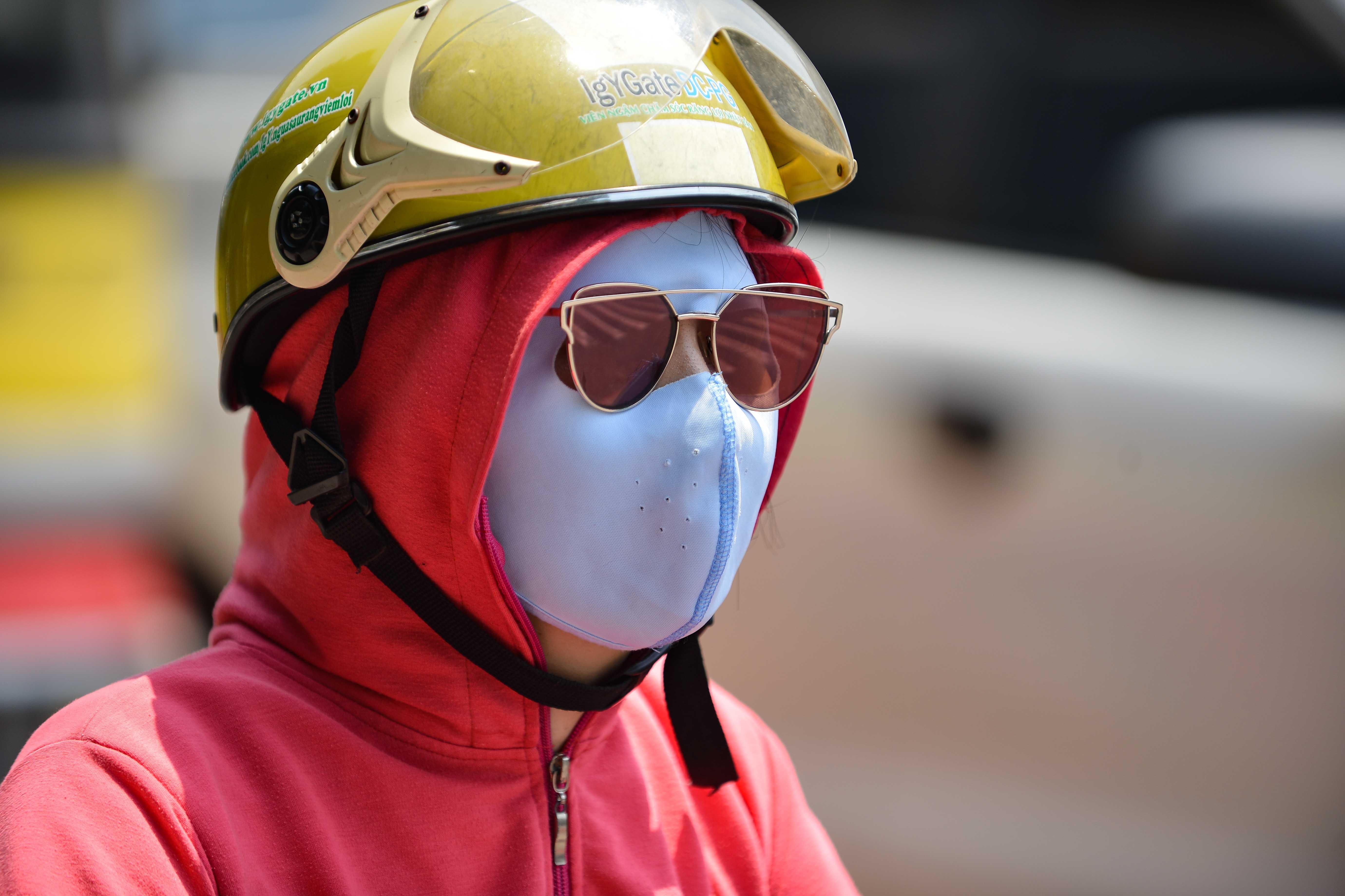 Muon kieu doi pho voi nang nong tai Ha Noi anh 2