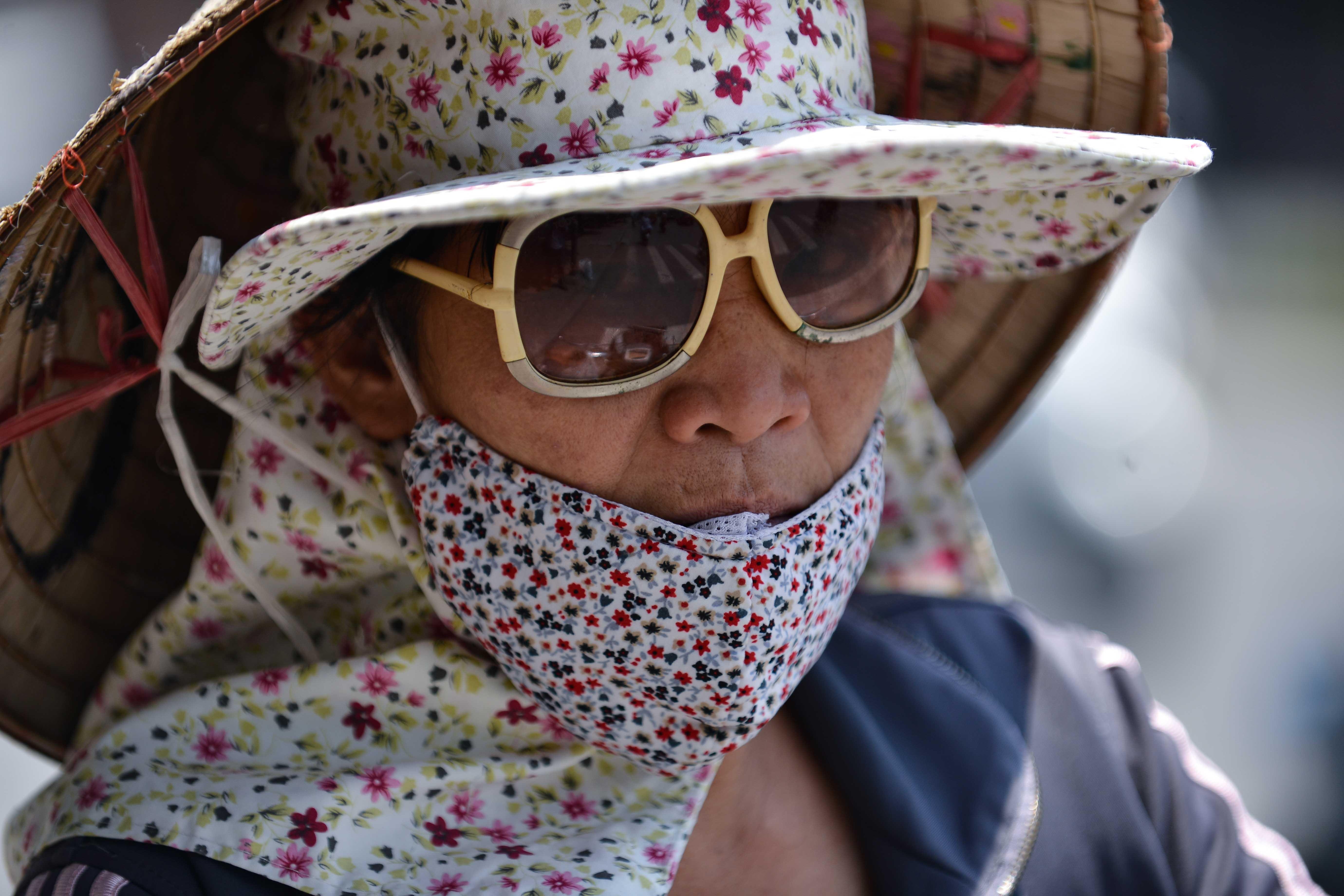 Muon kieu doi pho voi nang nong tai Ha Noi anh 7