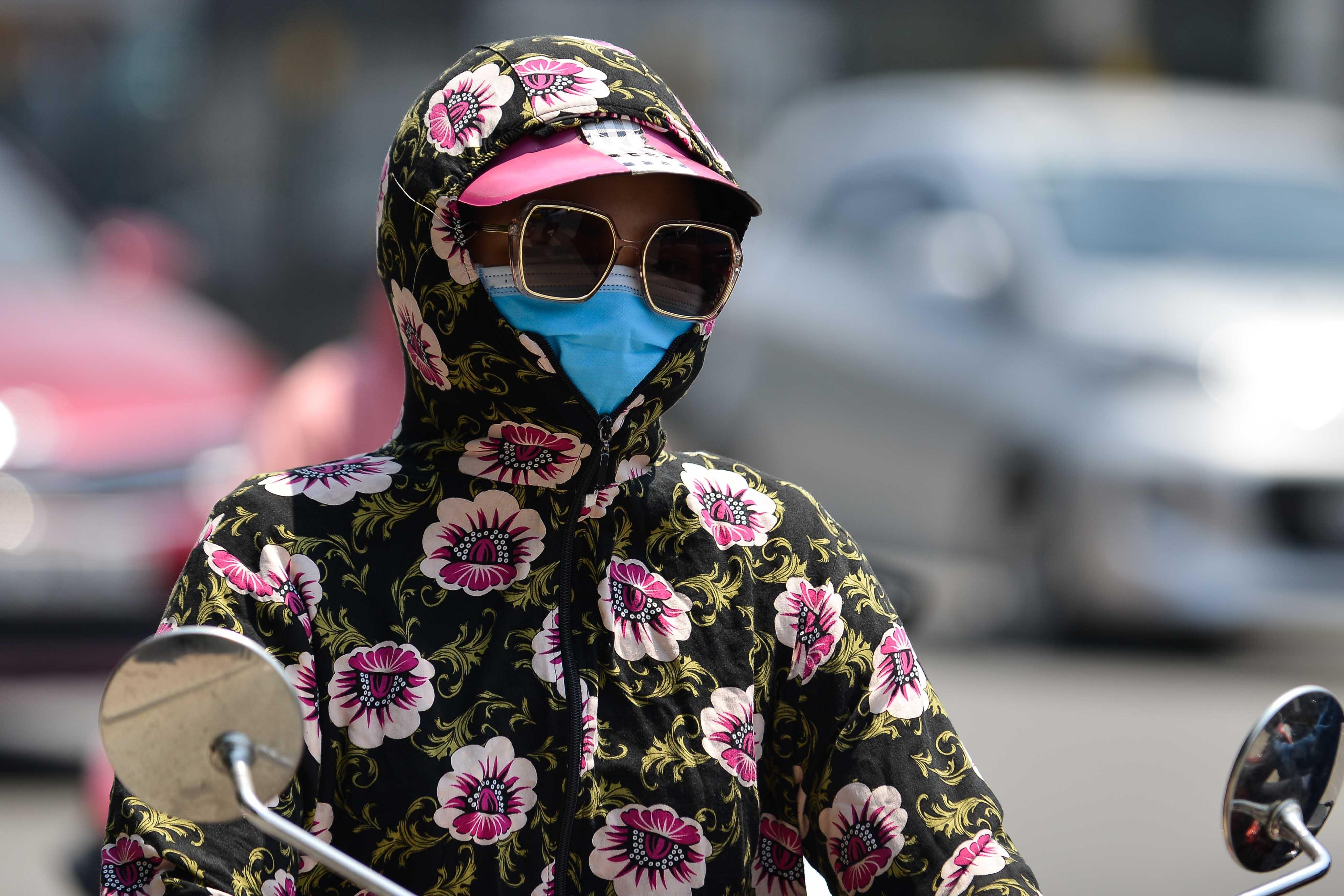 Muon kieu doi pho voi nang nong tai Ha Noi anh 6