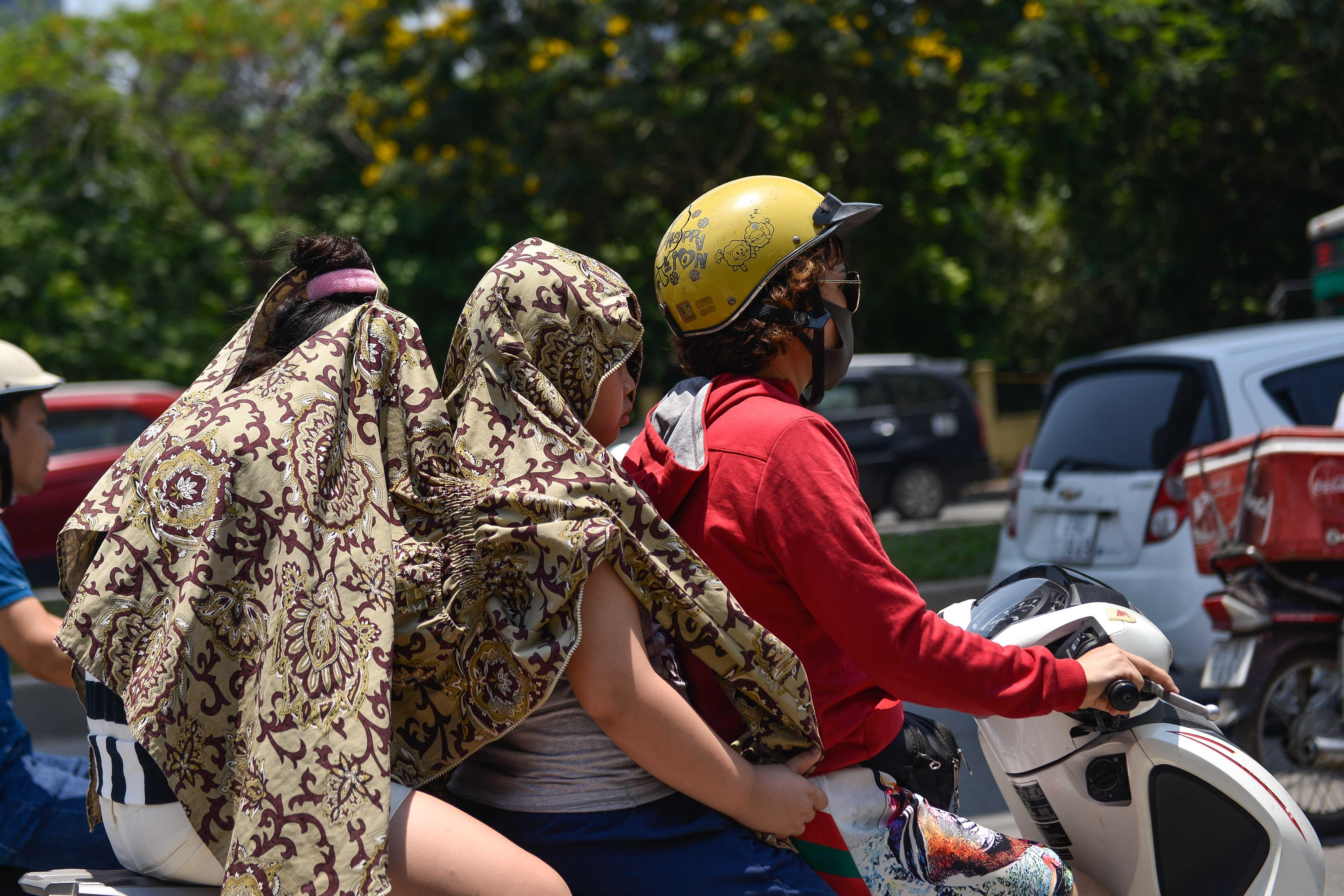 Muon kieu doi pho voi nang nong tai Ha Noi anh 12