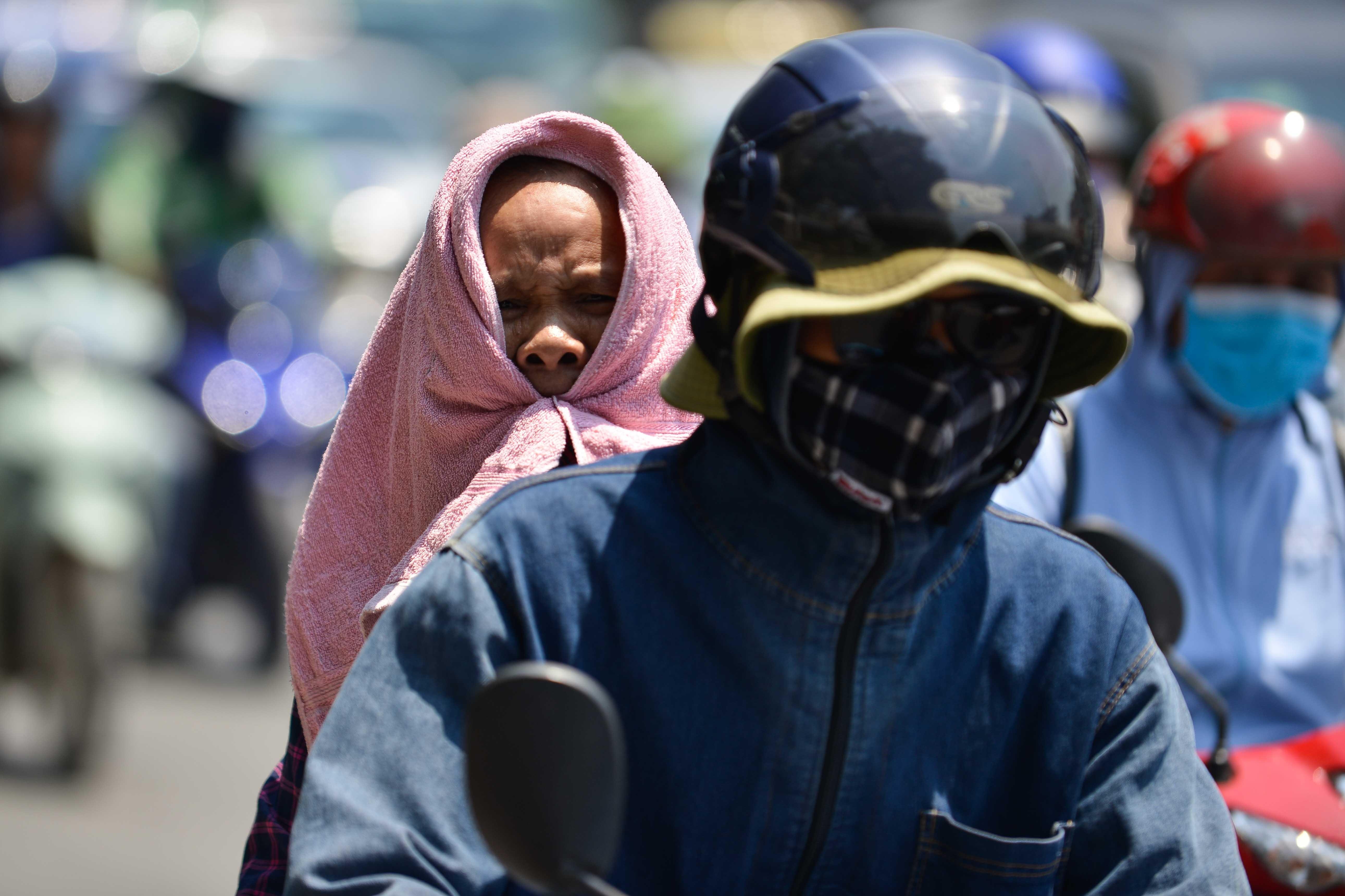 Muon kieu doi pho voi nang nong tai Ha Noi anh 11