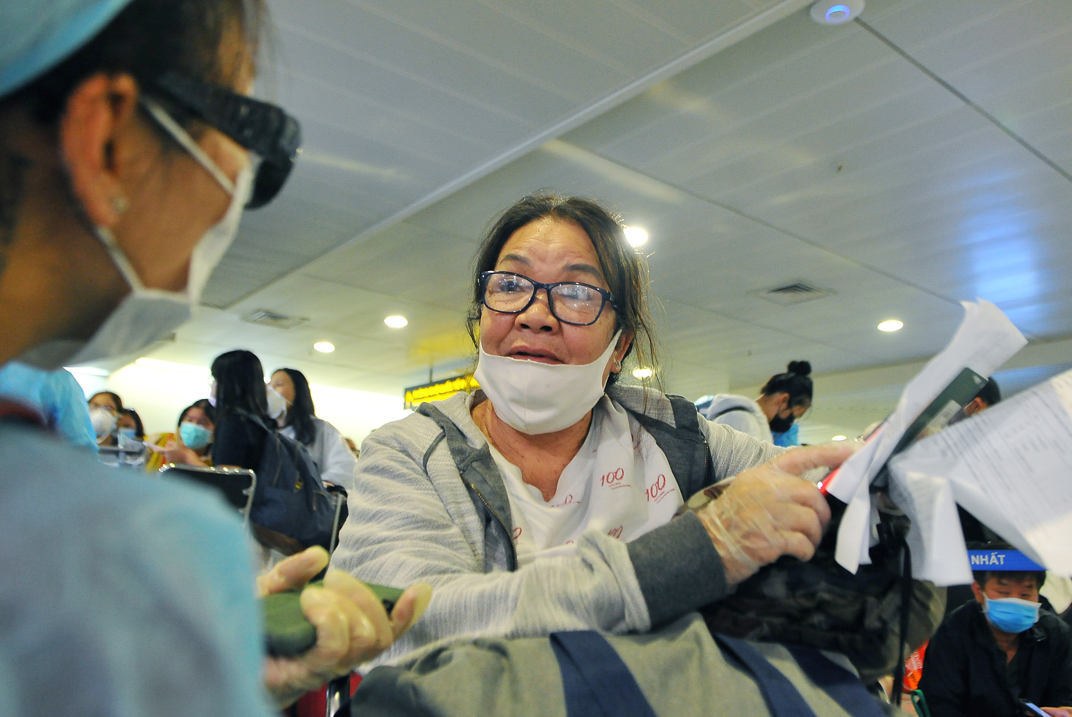 Chuyen bay cuoi cho nguoi Viet tu nuoc ngoai ve Tan Son Nhat anh 7