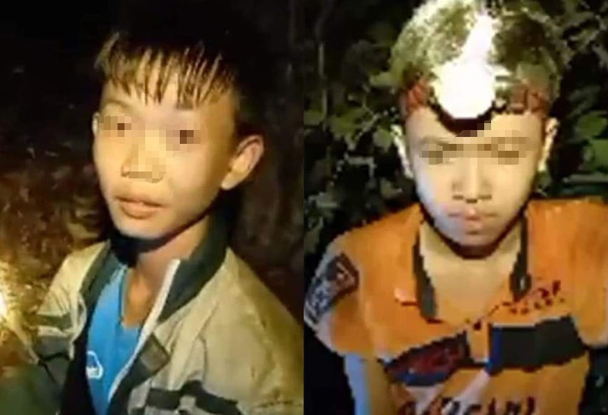 Cuu 2 hoc sinh mac ket tren vach nui hinh anh