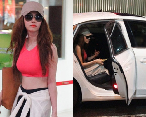 Ngan Khanh dien ao sieu ngan giua san bay hinh anh