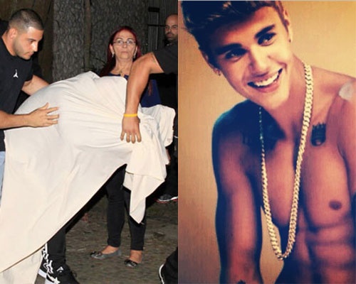 Justin Bieber duoc che chan khi buoc khoi… nha tho hinh anh