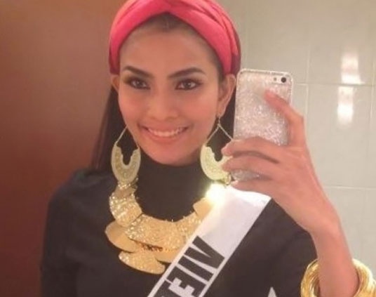 Truong Thi May bi cam lanh va sot cao tai Miss Universe hinh anh