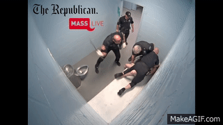 Sa thai 3 canh sat My hanh hung pham nhan trong phong giam hinh anh