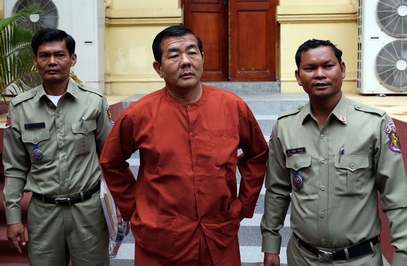 Cựu cảnh sát trưởng Phnom Penh giết người,  sở hữu tiền giả  ảnh 1 Cuu canh sat truong Phnom Penh giet nguoi,  so huu tien gia anh 1