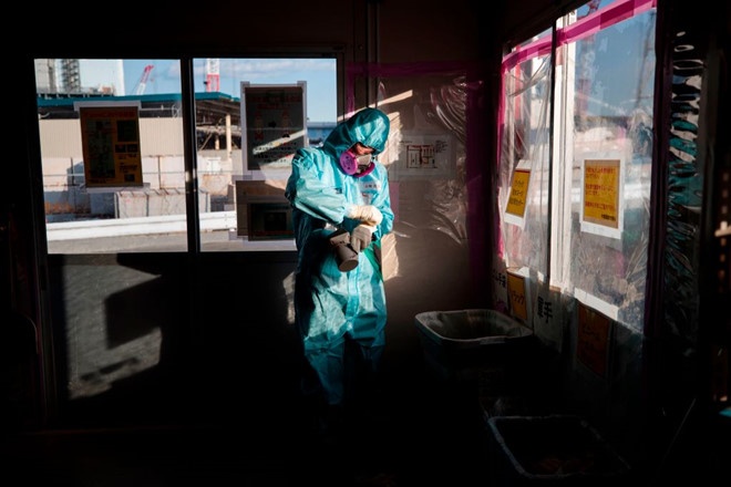 Lao dong Viet Nam lam viec tai khu vuc nhiem xa anh 1