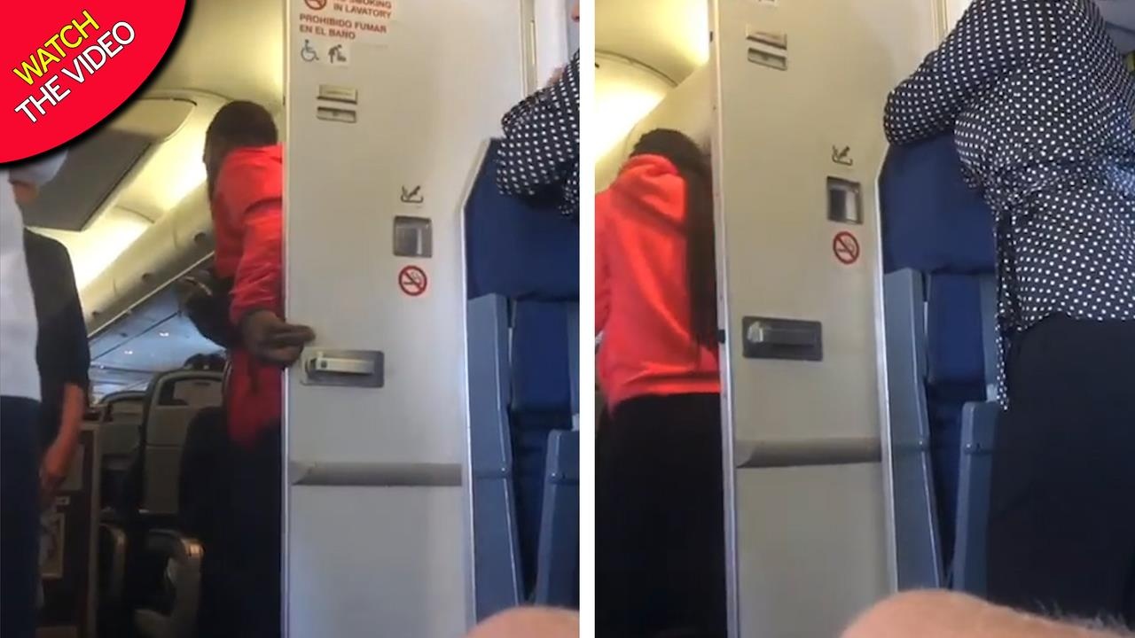 Hanh khach quan he tinh duc trong nha ve sinh may bay United Airlines hinh anh