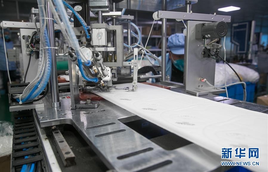 nha may san xuat khau trang anh 8