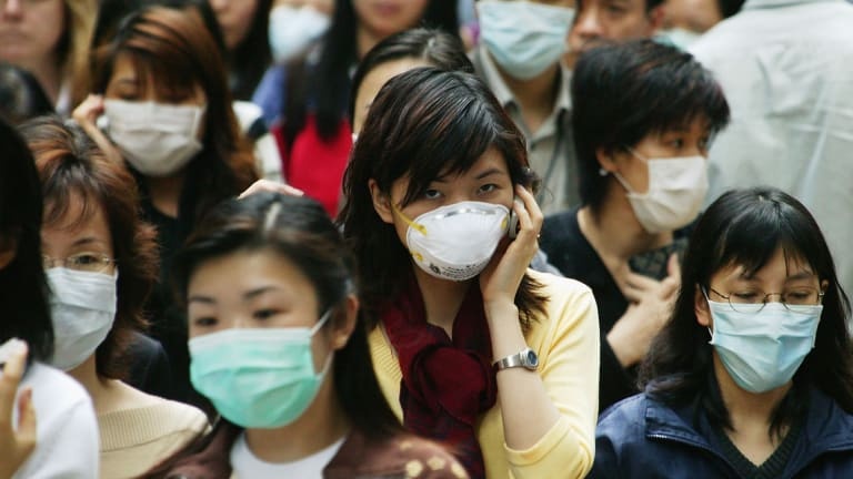 Trung Quoc phan ung cham tre voi Covid-19 anh 1