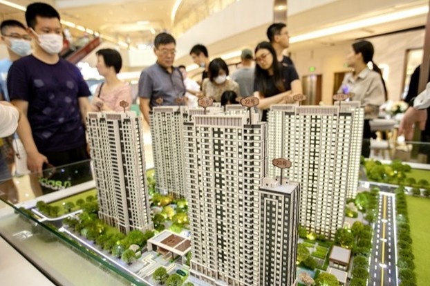 Nguoi Trung Quoc ly hon gia de mua them nha hinh anh