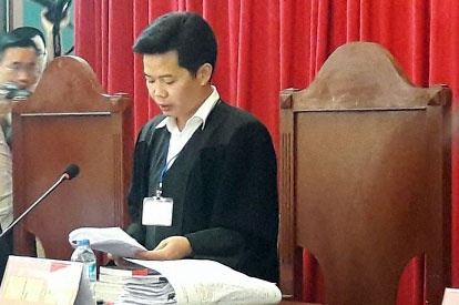 Chu toa tuyen an voi 14 bi cao trong vu sai pham dat o Dong Tam hinh anh