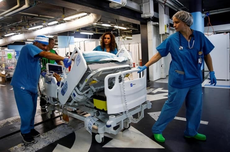 Cuoc 'di cu' xuong long dat cua y te Israel hinh anh