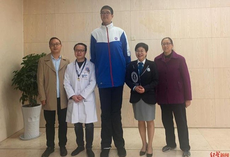 Noi am anh chieu cao cua cha me Trung Quoc hinh anh