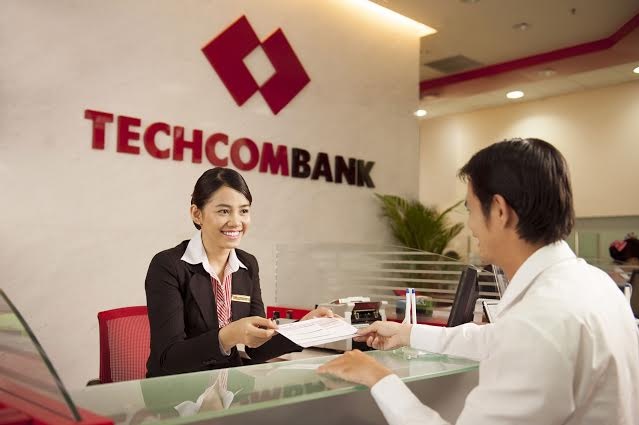 Techcombank bao lai hon 670 ty, dat mot nua muc tieu 2014 hinh anh