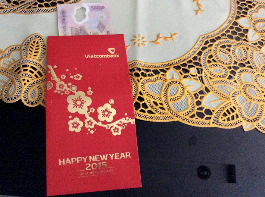 Ngan hang li xi, tang tien cho khach dip dau nam hinh anh