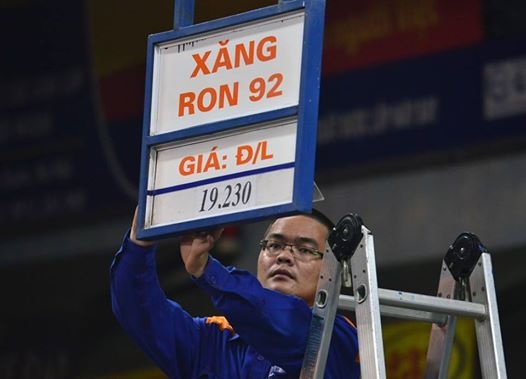 Xang tang gan 2.000 dong/lit tu 21h toi 5/5 hinh anh