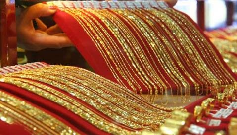 Vi sao gia vang lien tuc thay doi? hinh anh