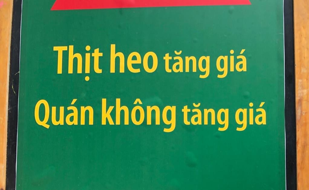 Giua bao gia thit lon, hang quan phan ung nhu the nao? hinh anh