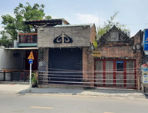 UBND quan 2 bac thong tin quan bar Buddha hoat dong tro lai hinh anh