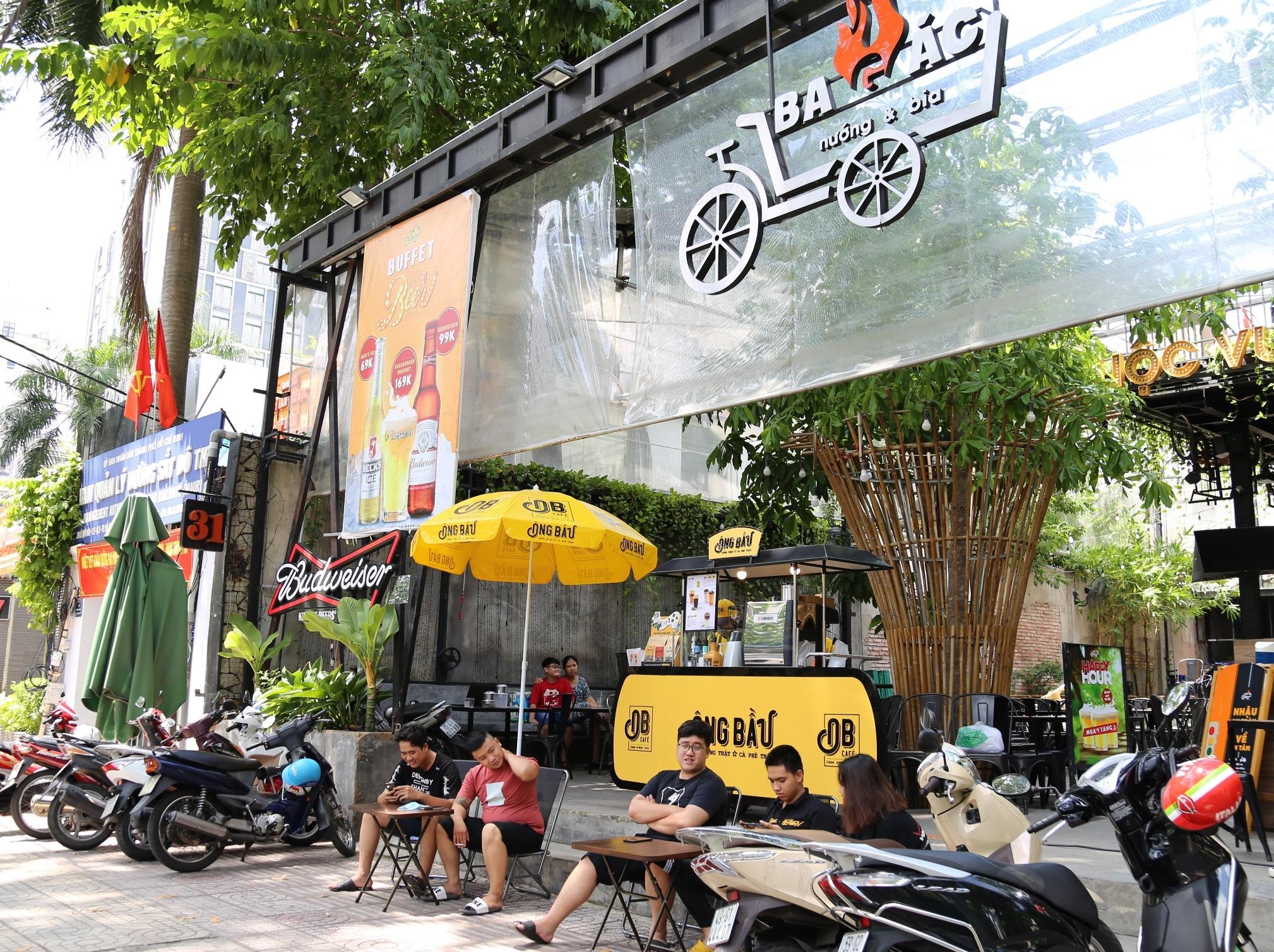 Doanh nghiep tim cach song chung voi dich anh 2