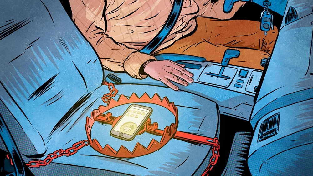 Dùng điện thoại khi lái xe ảnh 1 Dung dien thoai khi lai xe anh 1