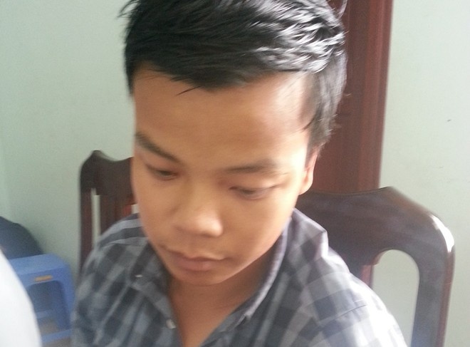 Nghiêm Quang Đạo khi bị bắt giữ. Ảnh: V.Đức.